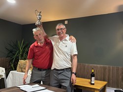 The winning Captain Terry hoisting the Zsibrita Cup
