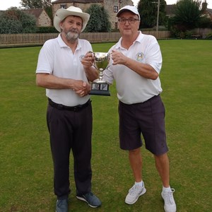 Men's club champion Jonny Abbott receiving trophy from runner up Richard Lambert
