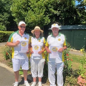 Clive Young, Carol & Kelvin Mcildoon proudly showing off their Hot shots certificates, and badges which they won in a recent internal league game