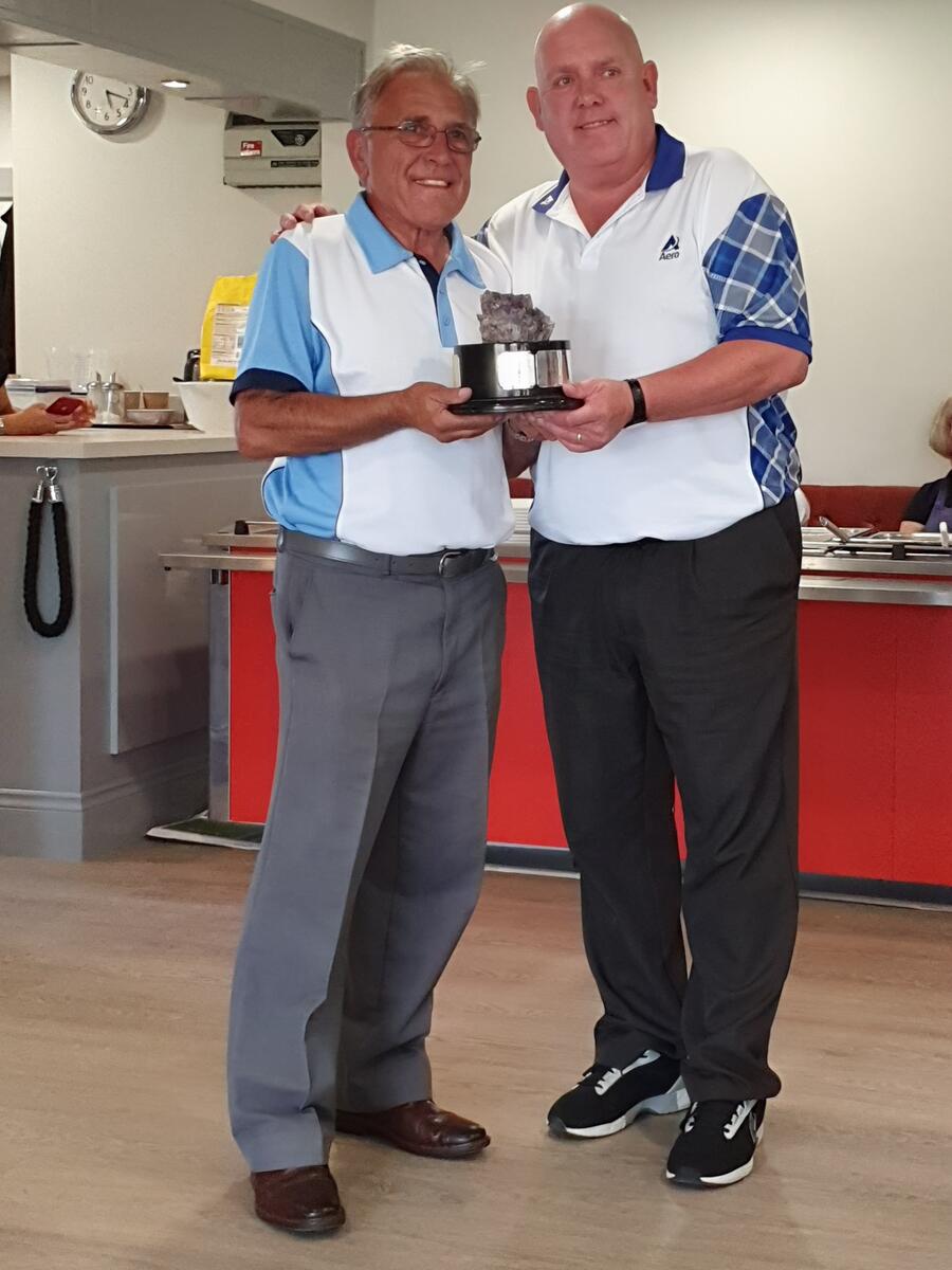 Alex Marshall presenting the "Jack Partridge Crystal Memorial Trophy" to the winning Northampton Whyte Melville Bowls Club Captain Neville Bodily Alex Marshall presenting the "Jack Partridge Crystal Memorial Trophy" to the winning Northampton Whyte Melville Bowls Club Captain Neville Bodily