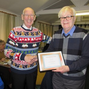 Eddie Rule presented with his honorary certificate