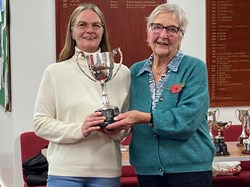 Jane Ward wins the Ladies Champion trophy for the second successive year.