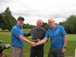 Richard again this time with his father receiving the father and son trophy