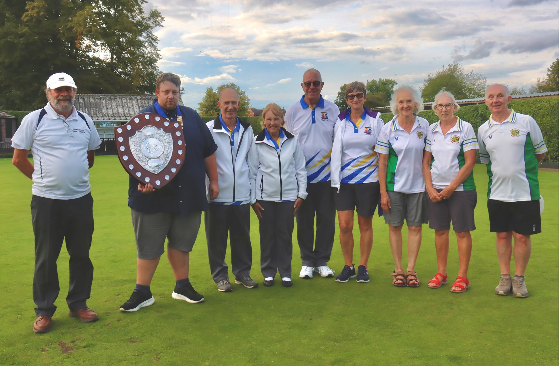 L to R: Acting Chairman Don McGarrigle, President James Henderson, winning team: John Suffling, Shirley Suffling, Graham Hulme and Lynn Hulme; runners-up Miriam Hulbert. Lesley Simmonds and Ken Simmonds