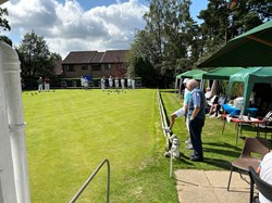 Greenkeeper keeping an eye on proceedings