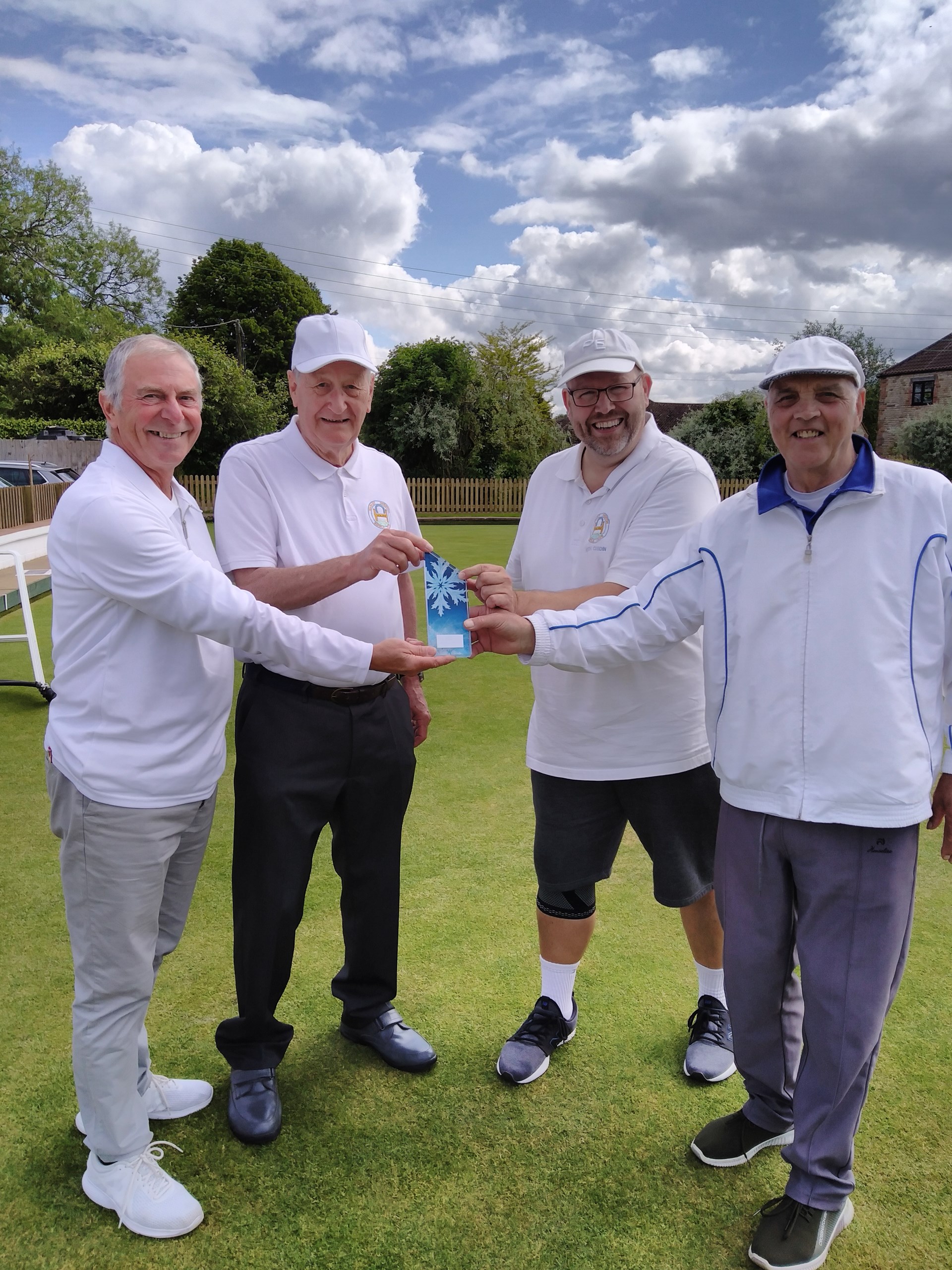 Runners Up Bruce Acock & Keith Cusdin (on R) presenting the trophy to Kevin Thomas & Dave Cutbush