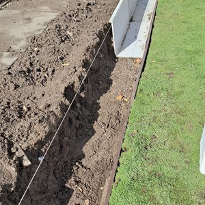 The very start. Alan & myself ( Brian) laying the datum. Many thanks also go to Phil  & Amanda for their continued help.carrying on .