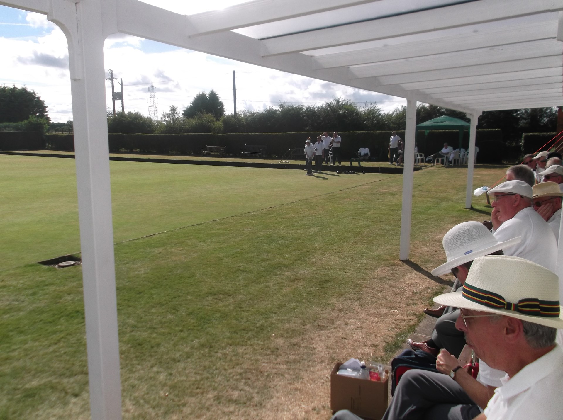 Members enjoying the protection afforded by the new awning Members enjoying the protection afforded by the new awning
