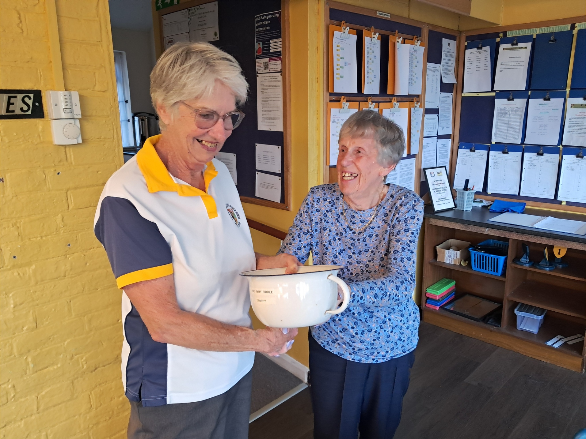 Jill presents Anne with the trophy she always wanted