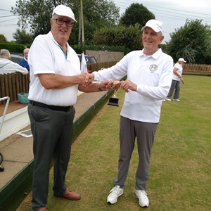 Novice Cup winner Ian Hamblett (on right) receiving cup from runner up Paul Drage