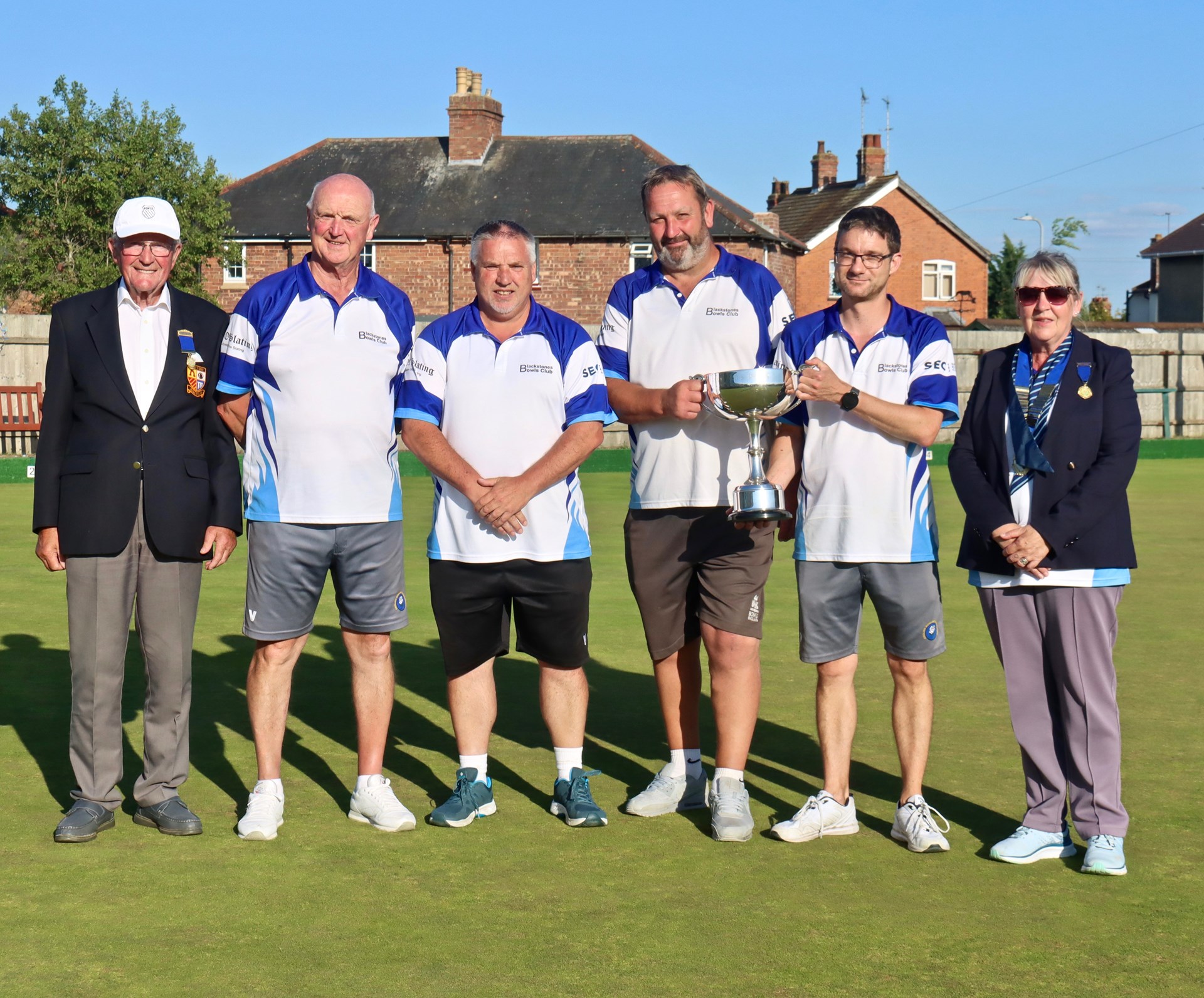 Winners Adam Warrington (right), Jon Earl, Mike Humphries and Martyn Dolby with Chairman Charlie Underwood and President Rita Downs