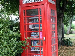 Phone Box at The Lye converted to a book library