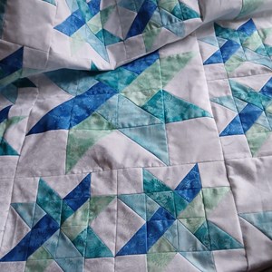 Quilt expertly made by Liz Hosmer, was won by Kevin Thomas