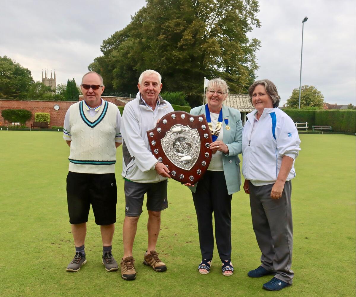 2024 winners Stamford Town (KV): from left to right John Holroyd, Kevin Vinter, President Rita Downs, Moira Holroyd