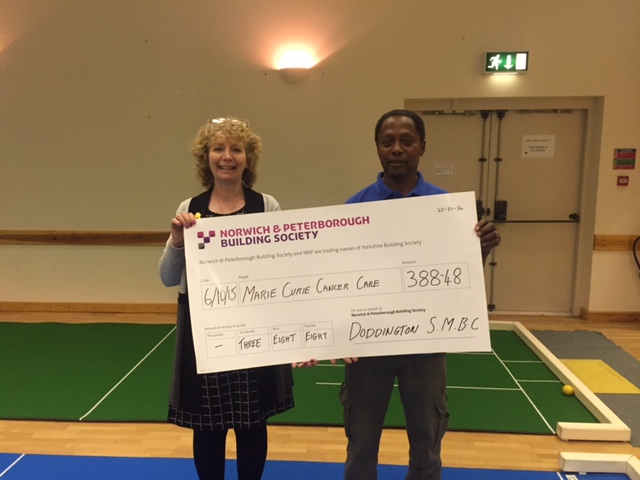 Joe Peters presents Marie Curie with the funds raised at the Chloe Shield 2015