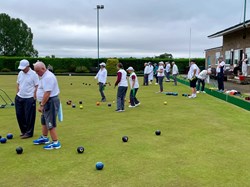 I thought bowls were black?... Not according to competitors in the KMBC Floodlight (3 wood) Triples!