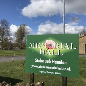 Memorial Hall's green signboard