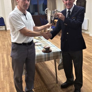 Hovingham League Captain Ed Charge receives the Winner's Trophy 2019