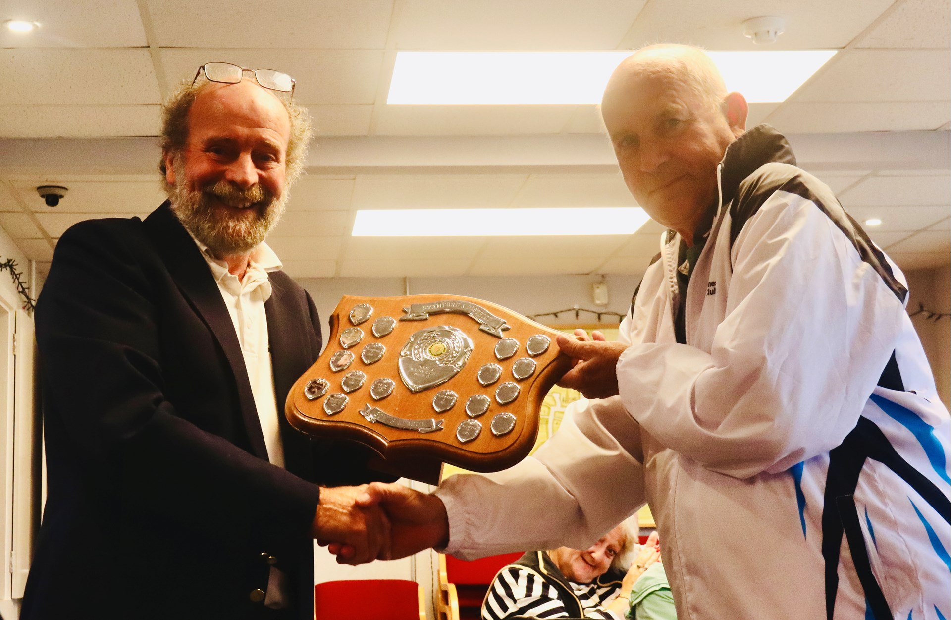 Acting Chairman Don McGarrigle presenting the Boor & Wainwright Shield to Blackstones D captain Pete Linnell