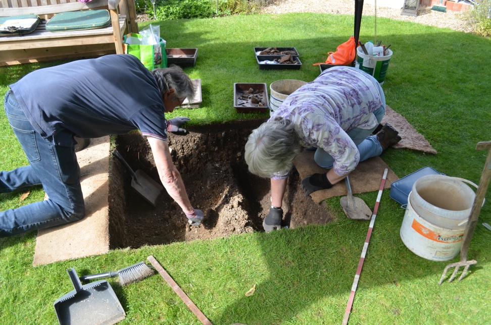 Volunteers hard at work on a test pit