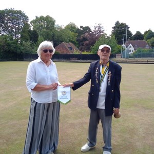 Annette presenting a pennant to Scalby