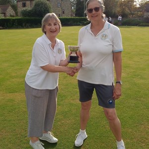 Ladies Club Champion Colleen Laker on left receiving trophy from runner up Liz Dyer