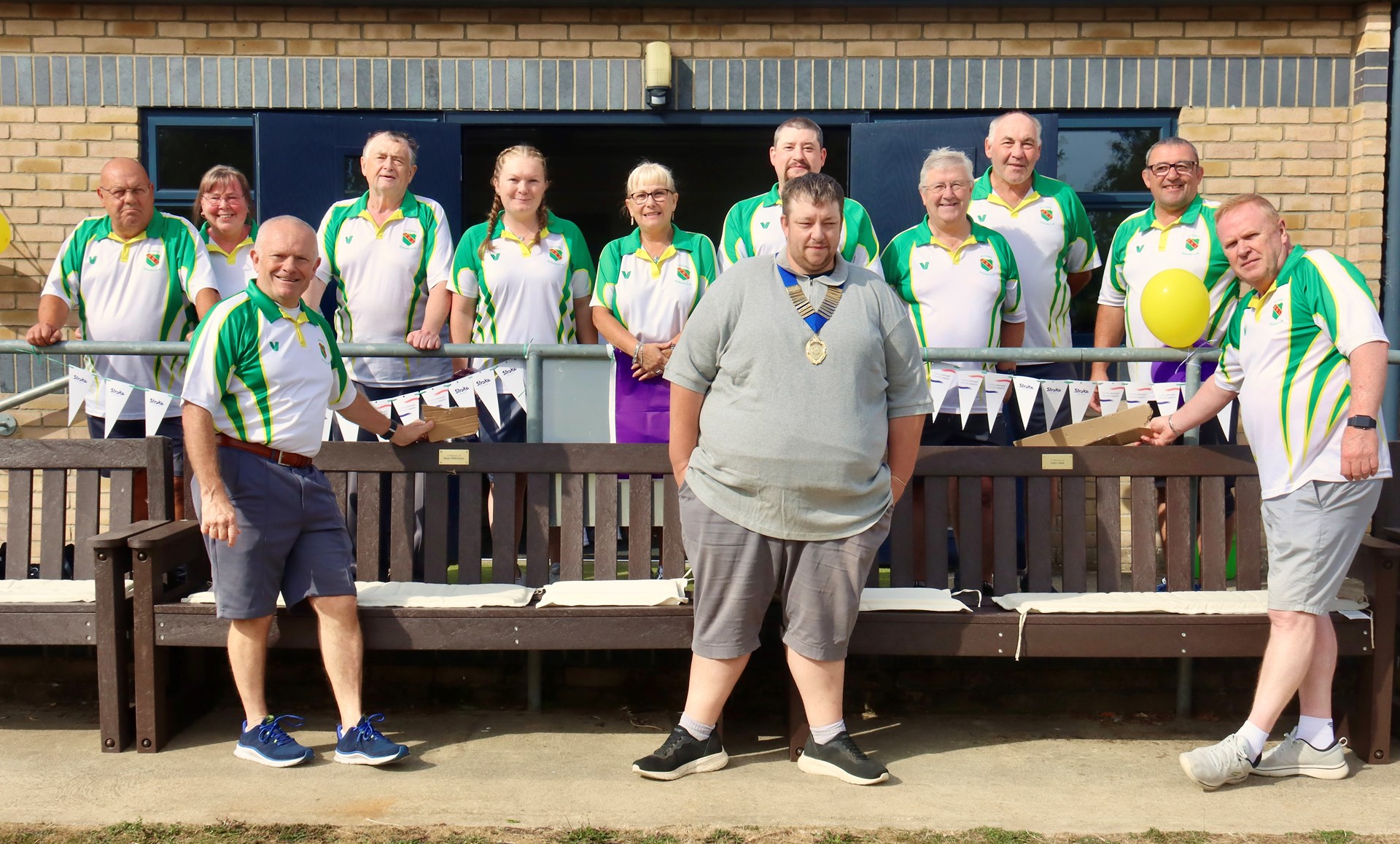 Members of Wittering Bowls Club unveiling memorial plaques.