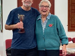 Alan Gough collects the trophy for the Ladies v Gents competition, on behalf of the team.