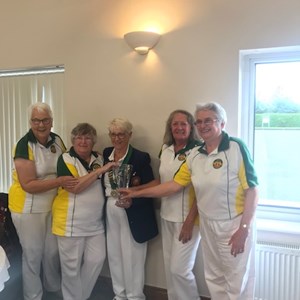 Jenny Turrell, Barbara Sparling, Carol Mcildoon & Susan Cookson accepting the Southampton & District ladies division 1 league triples runners up trophy. Missing from the photograph are Jackie Snow, Marguerite Oliver, Jan Bunker, and Jill Meager