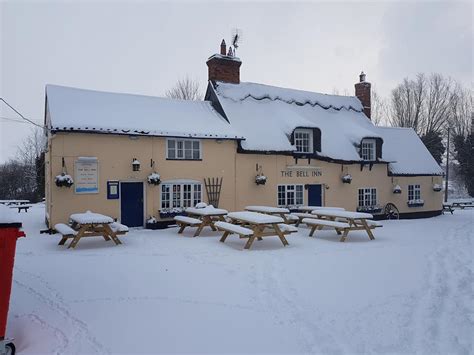 The Bell Inn during a snowy winter.