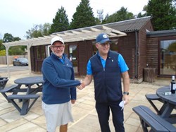 Warwick shaking hands with a dejected Alan who was pipped to a win on countback!