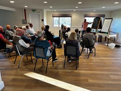 An indoor ‘coaching’ session (on a blackboard not grass)