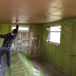 Ceiling plastered, walls insulated, fire boarding to rear boundary wall, vapour barriers, Thur 27 Feb 2025
