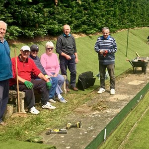 31 May: Ketton bowlers have been fitting an artificial turf bank at their green.