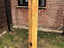 Oak marker post from wood from felled 100-year old oak tree. Carved by The Oak & Rope Company.