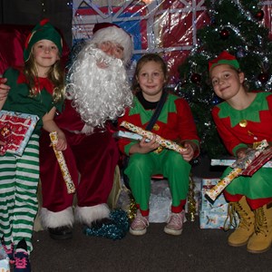 Father Christmas and his elves in the Grotto
