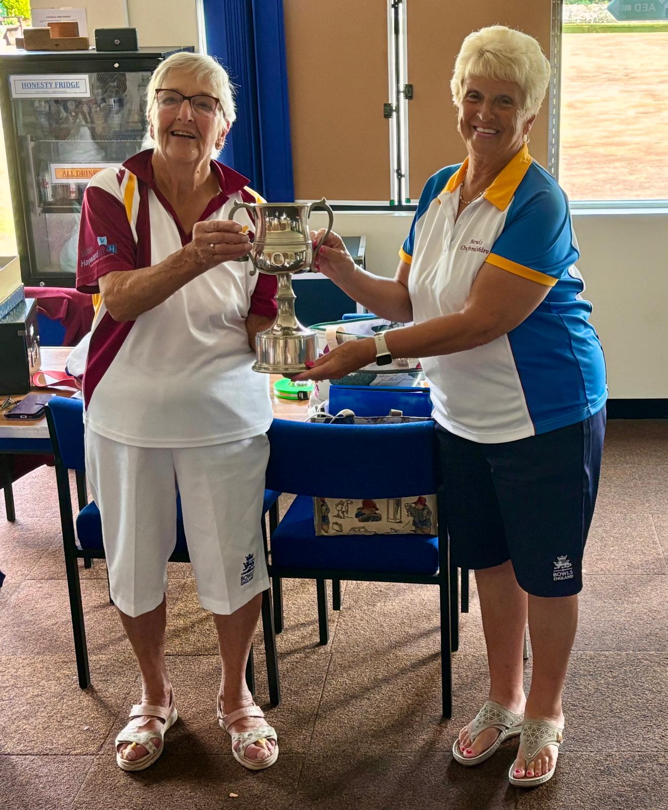 Captain Wendy Cross is presented with the Top Club Trophy