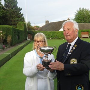 Terry Atkinson presents the Thom Trophy to Irene O'Brien