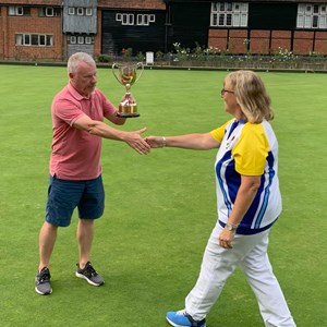 2 Woods winner Sandra receives cup from Club Chair Perry