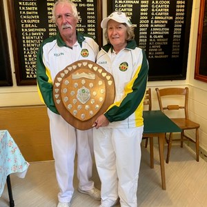 Carol & Kelvin Mcildoon with their winning Sidwell pairs shield after beating Marguerite & Martin Oliver in the Final
