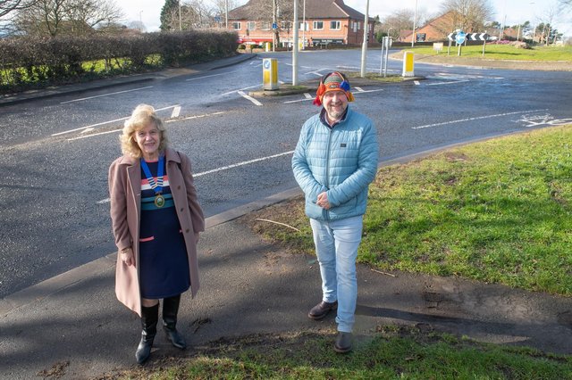 Councillor Lynda Wallis, Chairman of Seamer Parish Council and Andrew Santon, Customer Communications Officer with NYCC Highways, at the B1261 Station Road site to have the pavement extended and a dropped kerb installed, completing the pedestrian crossing