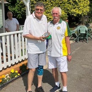 Trevor Foreman accepting the Morgan Trophy runners up trophy from President Kelvin