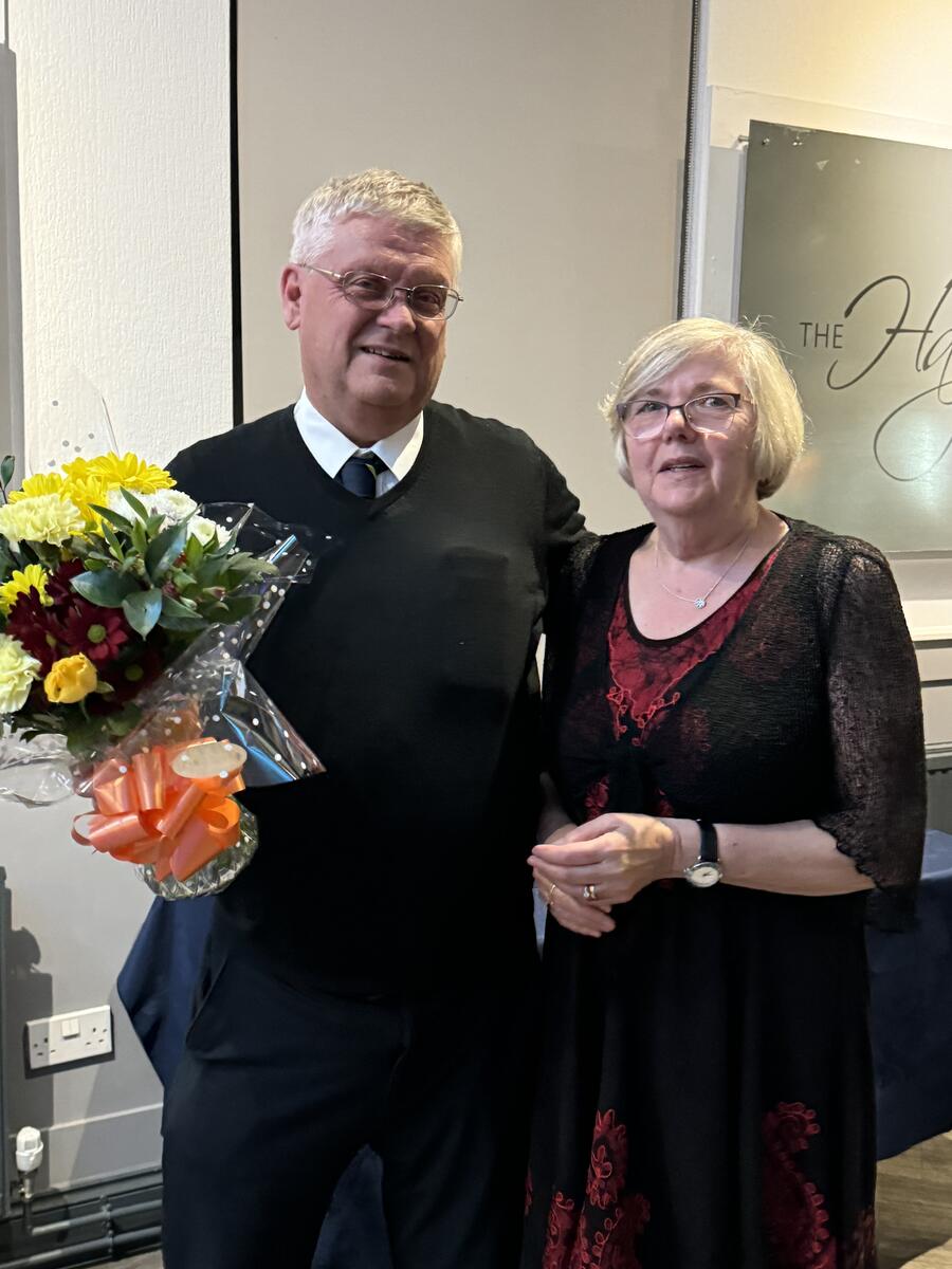 Val Carnegie with a bouquet of thanks for her hard work behind the bar (c) Cindy McLaughlin