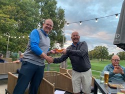 Steve presents the nearest the pin sleeve of balls to Tim