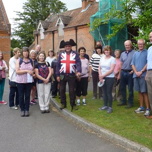 Sally Warner (front left) leading a group on a walk following in the footsteps of Jane Austin as part of the village  celebrations marking the bi-centenary of her death