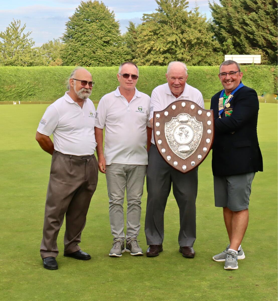 President Ally McNaughton with the winners of the Duncomb Shield 2022, Greetham Valley Eagles A. From the left: Bruce Strickland, Peter Wood, Frank Hinch, Ally McNaughton.
