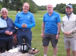 Colin, Tim and Nick are a bit out of focus whilst sharing the captains challenge
