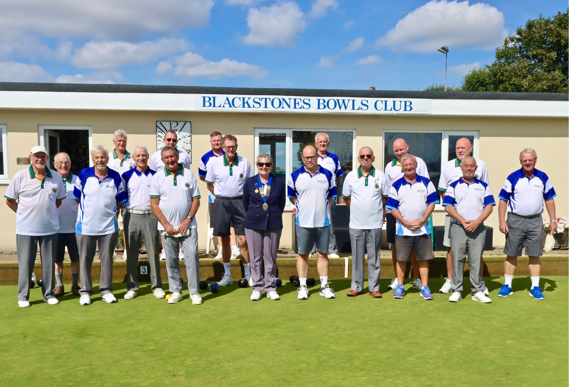 The two competing teams, Blackstones and Oakham, before the start of play, with President Rita Downs
