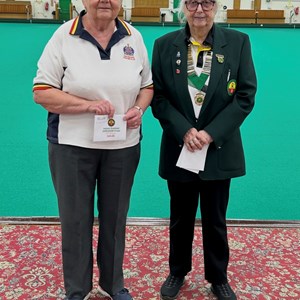 Sue Jones (C) receiving the 4th place award for the Indoor / Outdoor League