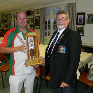 Chris Fenner presents Steve Thompson of North Down with the Farley Trophy